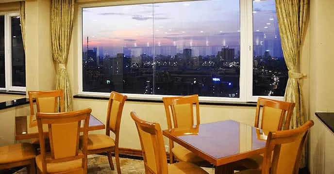 The buffet dining area offers panoramic views of Hanoi city.