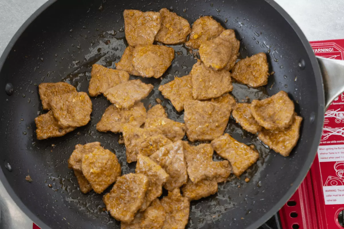 Soy protein cooking in a pan.