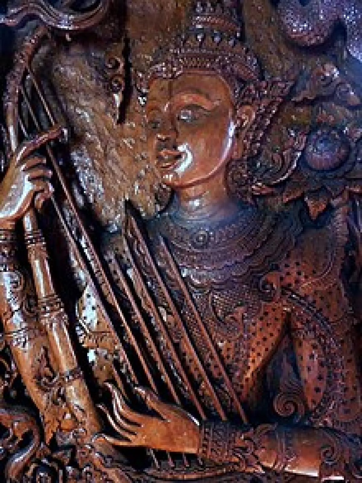 Wood carving of a gandharva, Thailand